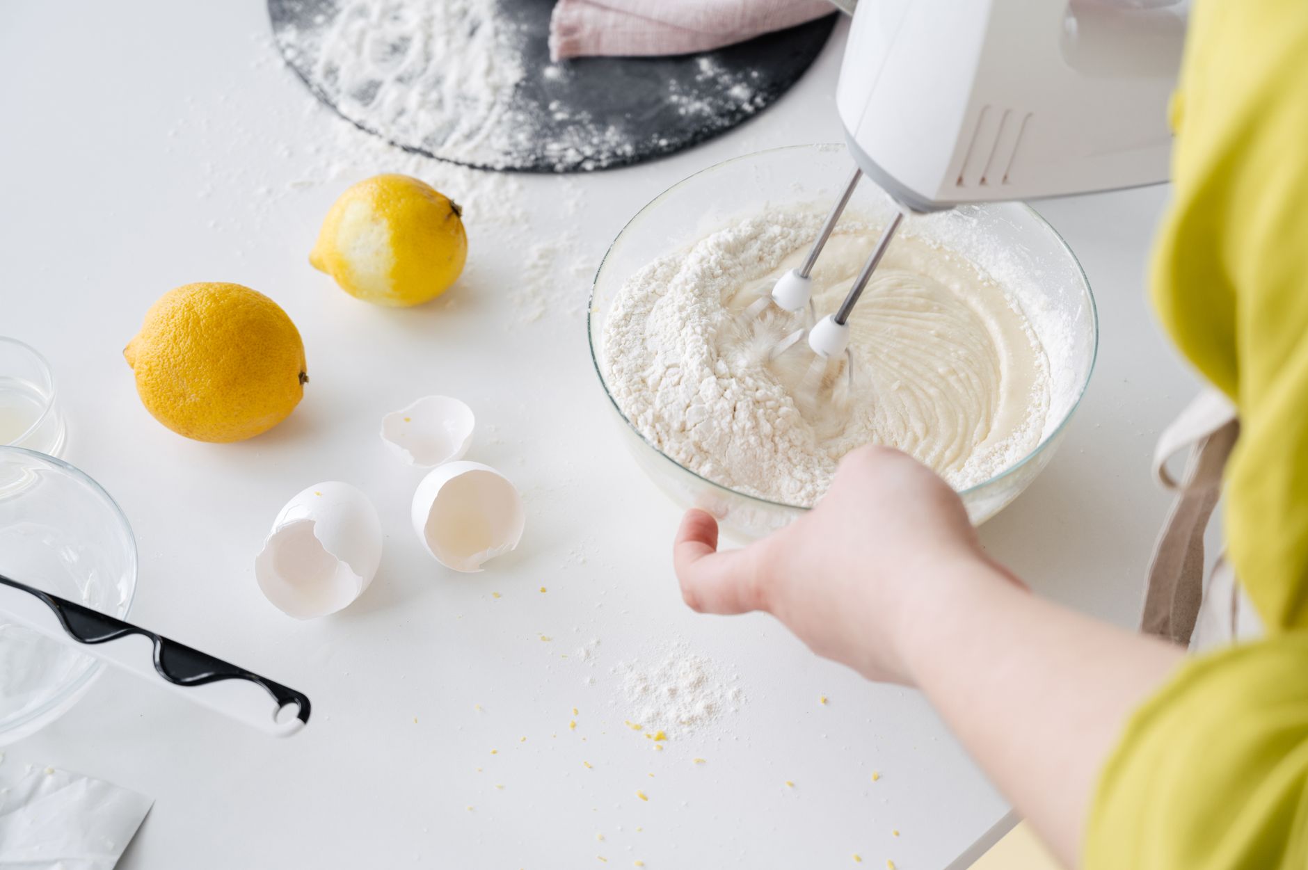 Spiral mixer with dough in mixing bowl, showing capacity and build quality